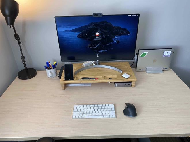 Photo of my desk surface with laptop, monitor, keyboard and mouse