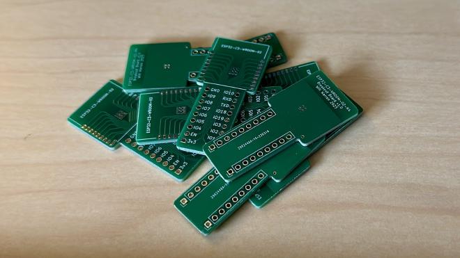 Pile of fabricated PCBs