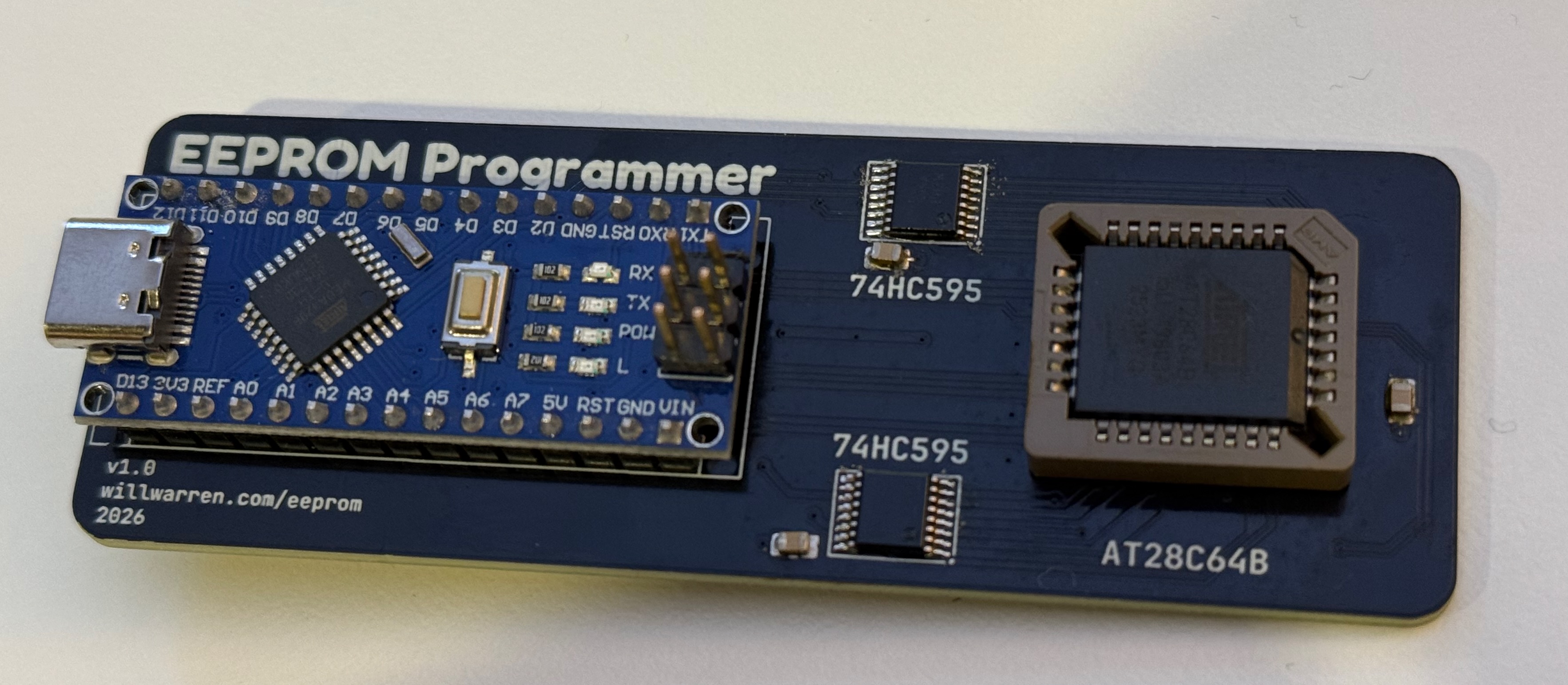 Photo of the EEPROM programmer. An Arduino Nano clone can be seen on the left, and the socketed EEPROM is visible on the right.