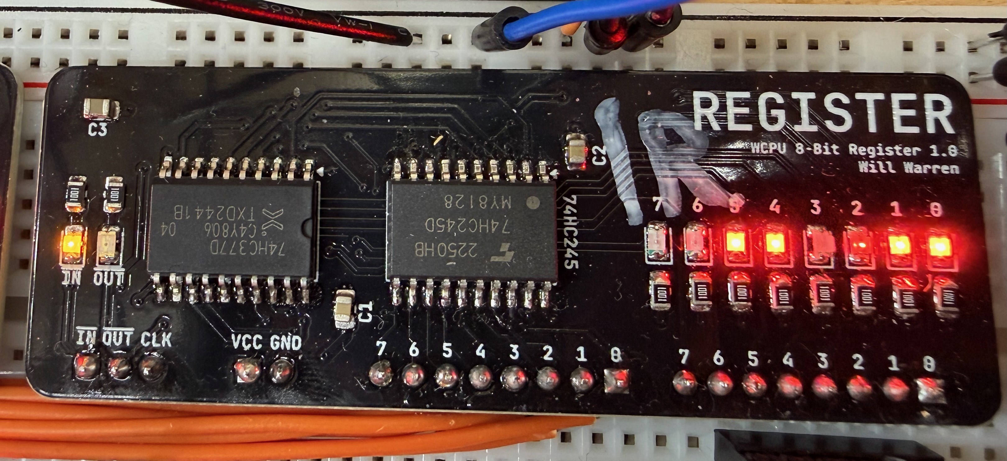 Photo of the generic Register PCB. It has 2 big-ish IC’s on it (the 74HC377 and the 74HC245) and 8 red LEDs